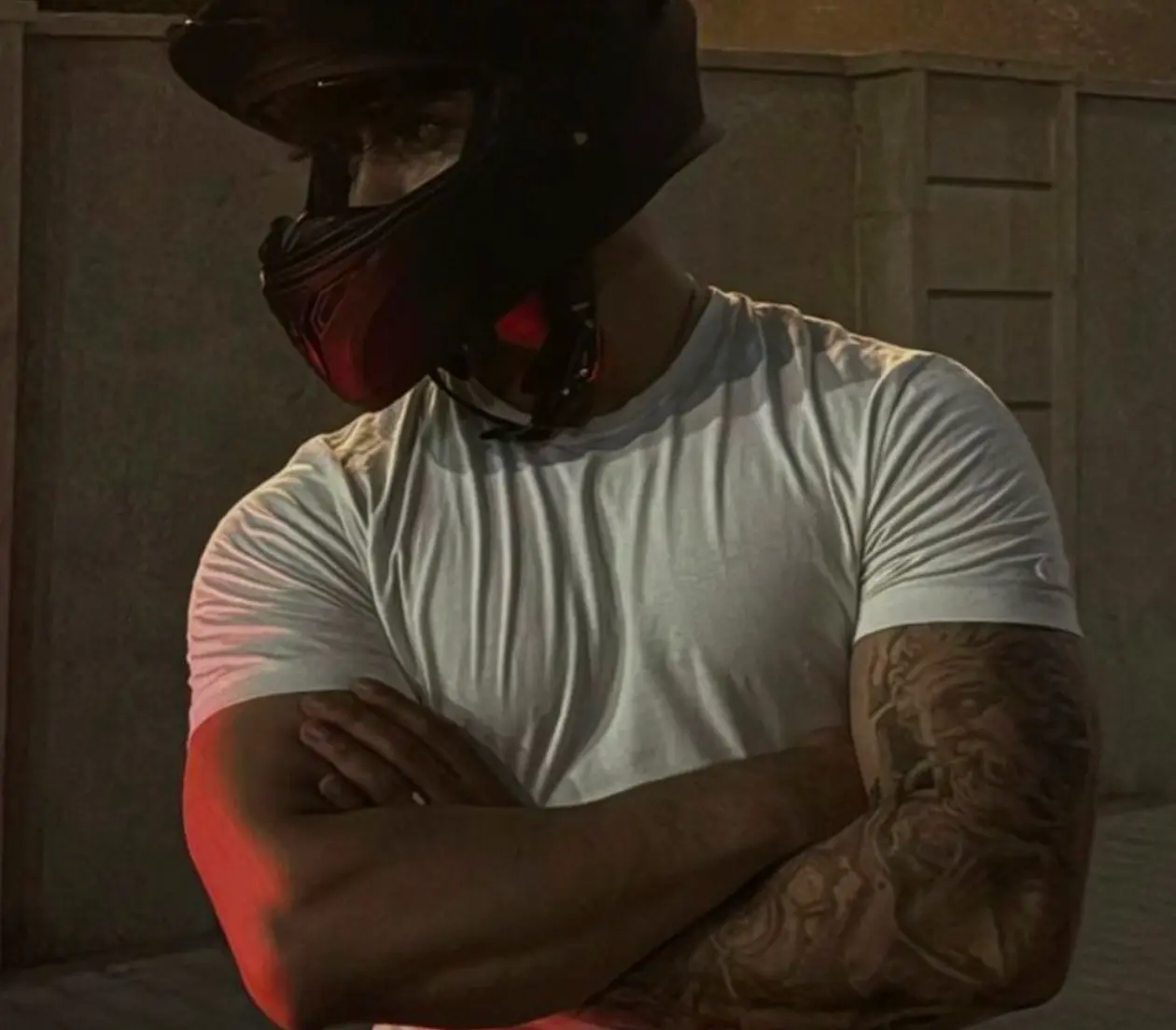 Biker-style AI boyfriend character wearing a helmet with a protective personality